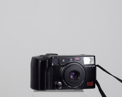 Olympus Infinity Zoom 200 35mm camera w/ manual and remote control