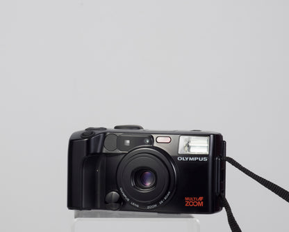Olympus Infinity Zoom 200 35mm camera w/ manual and remote control
