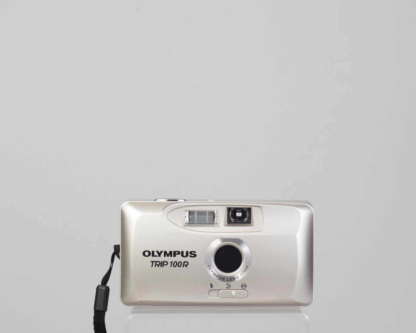 The Olympus Trip 100R compact 35mm camera featuring a wide 27mm lens