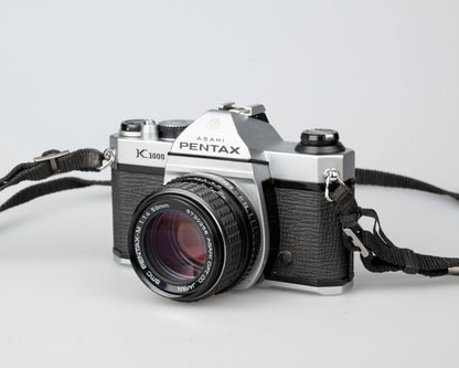 Pentax K1000 avec objectif SMC Pentax-M 50 mm F1.4 avec étui toujours prêt (série 8023813)