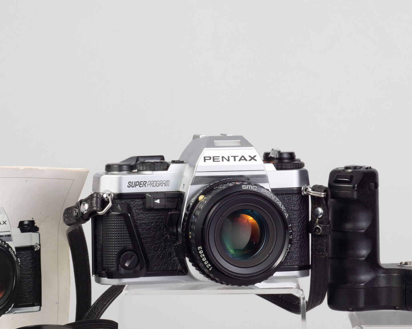 Reflex Pentax Super Program 35 mm avec objectif SMC Pentax A 50 mm f1.7 + ME Winder II + manuel d'origine