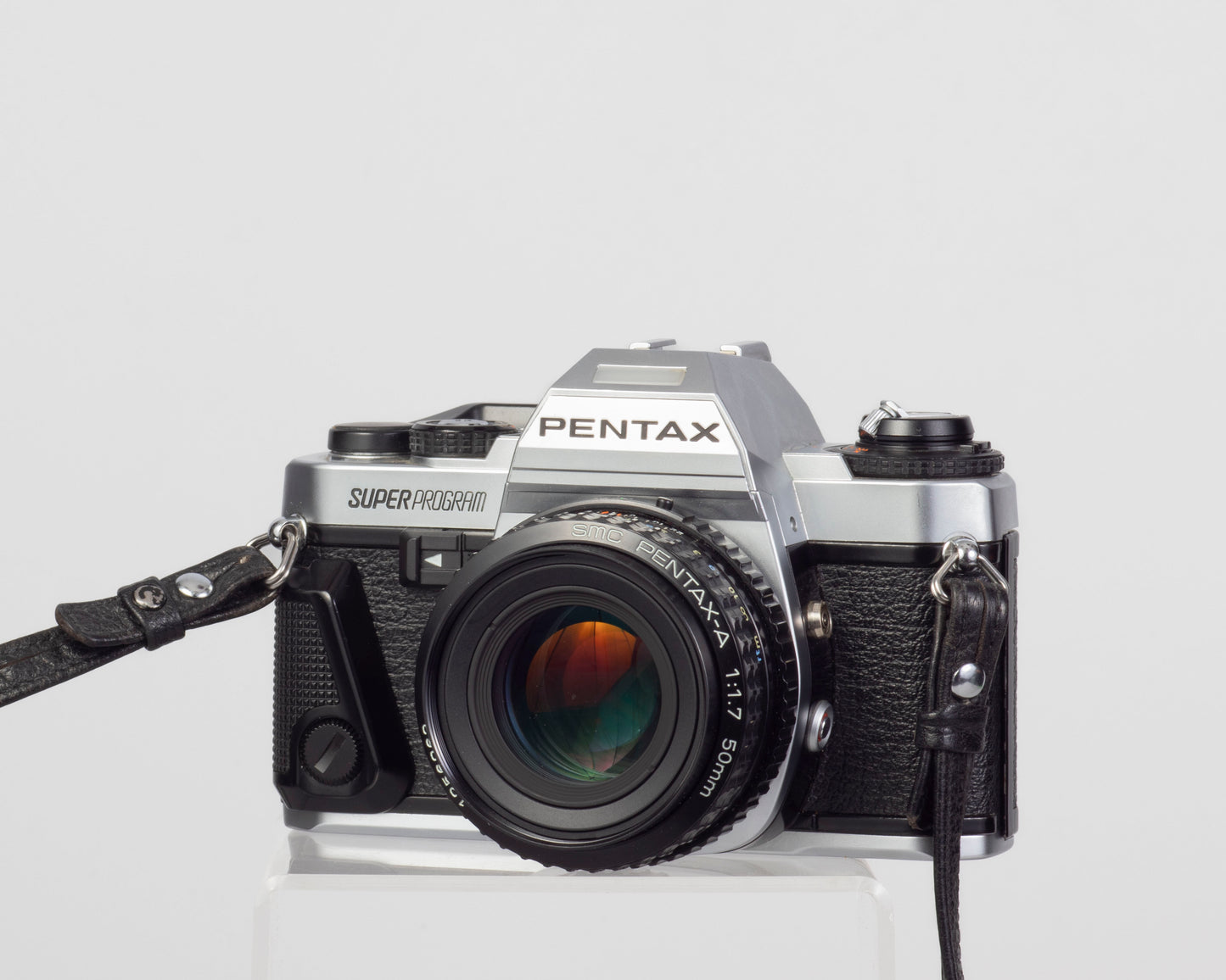 Reflex Pentax Super Program 35 mm avec objectif SMC Pentax A 50 mm f1.7 + ME Winder II + manuel d'origine