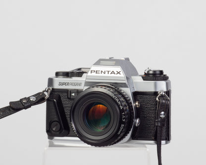 Reflex Pentax Super Program 35 mm avec objectif SMC Pentax A 50 mm f1.7 + ME Winder II + manuel d'origine