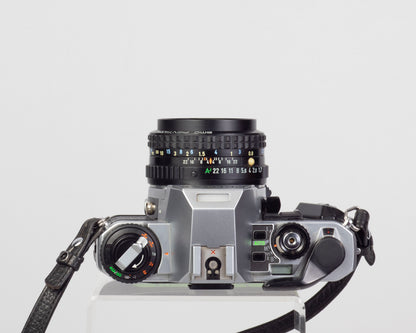 Reflex Pentax Super Program 35 mm avec objectif SMC Pentax A 50 mm f1.7 + ME Winder II + manuel d'origine