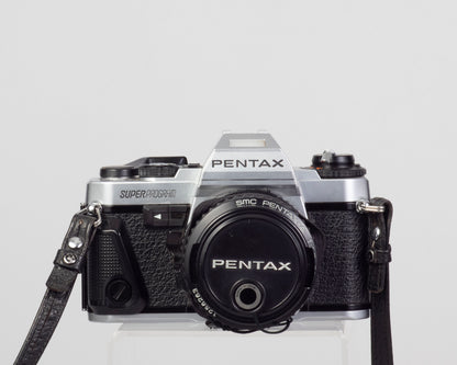 Reflex Pentax Super Program 35 mm avec objectif SMC Pentax A 50 mm f1.7 + ME Winder II + manuel d'origine