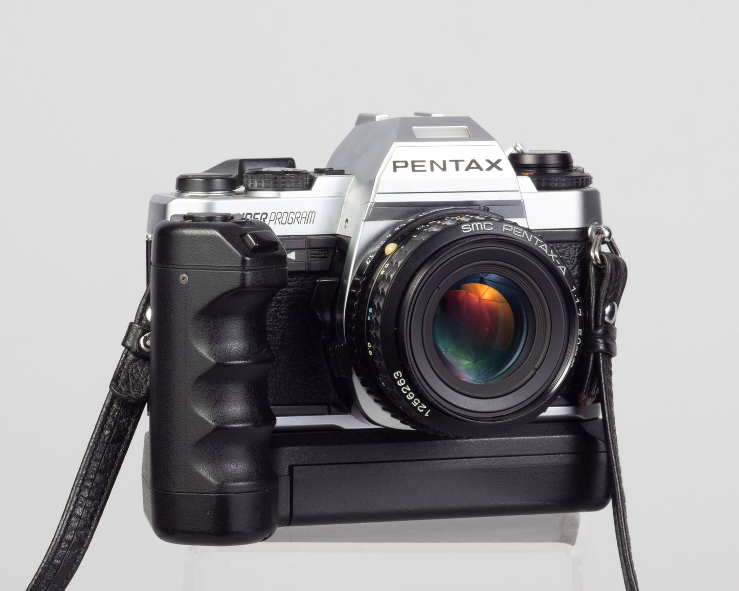 Reflex Pentax Super Program 35 mm avec objectif SMC Pentax A 50 mm f1.7 + ME Winder II + manuel d'origine
