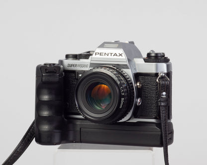 Reflex Pentax Super Program 35 mm avec objectif SMC Pentax A 50 mm f1.7 + ME Winder II + manuel d'origine