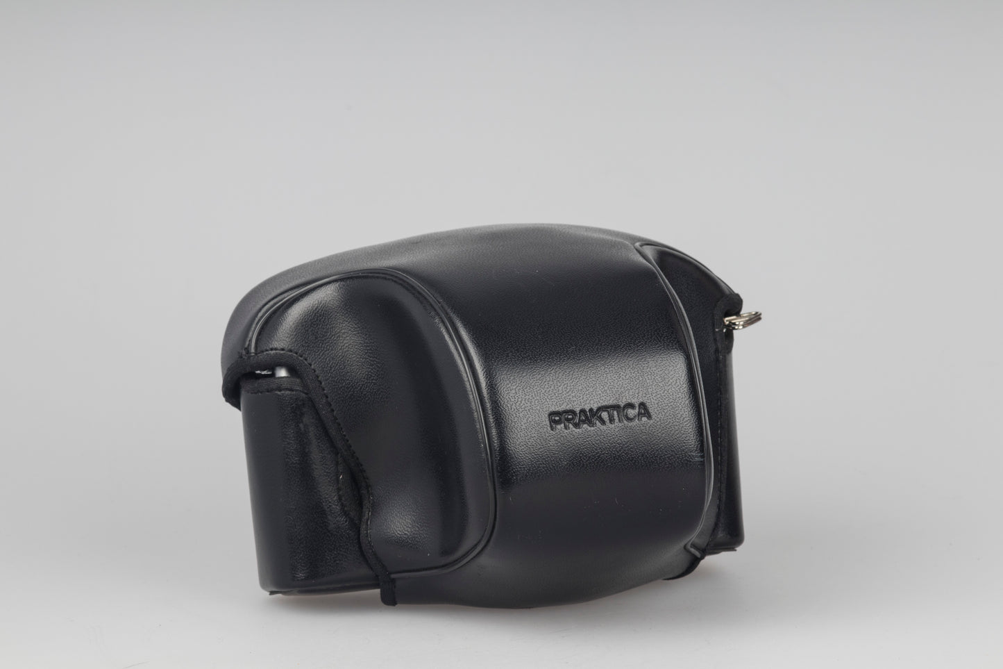 Praktica MTL 5 35mm film SLR camera with Rikenon 55mm f2.8 lens and ever-ready case