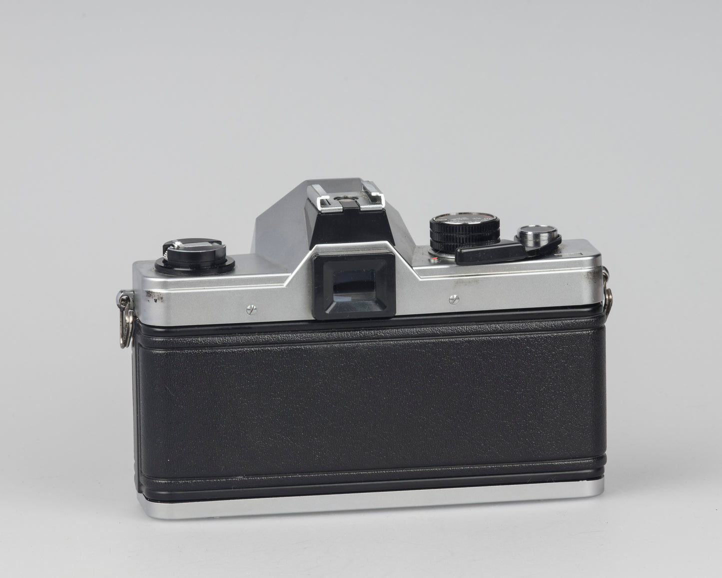 Praktica MTL 5 35mm film SLR camera with Rikenon 55mm f2.8 lens and ever-ready case