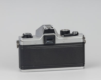 Praktica MTL 5 35mm film SLR camera with Rikenon 55mm f2.8 lens and ever-ready case