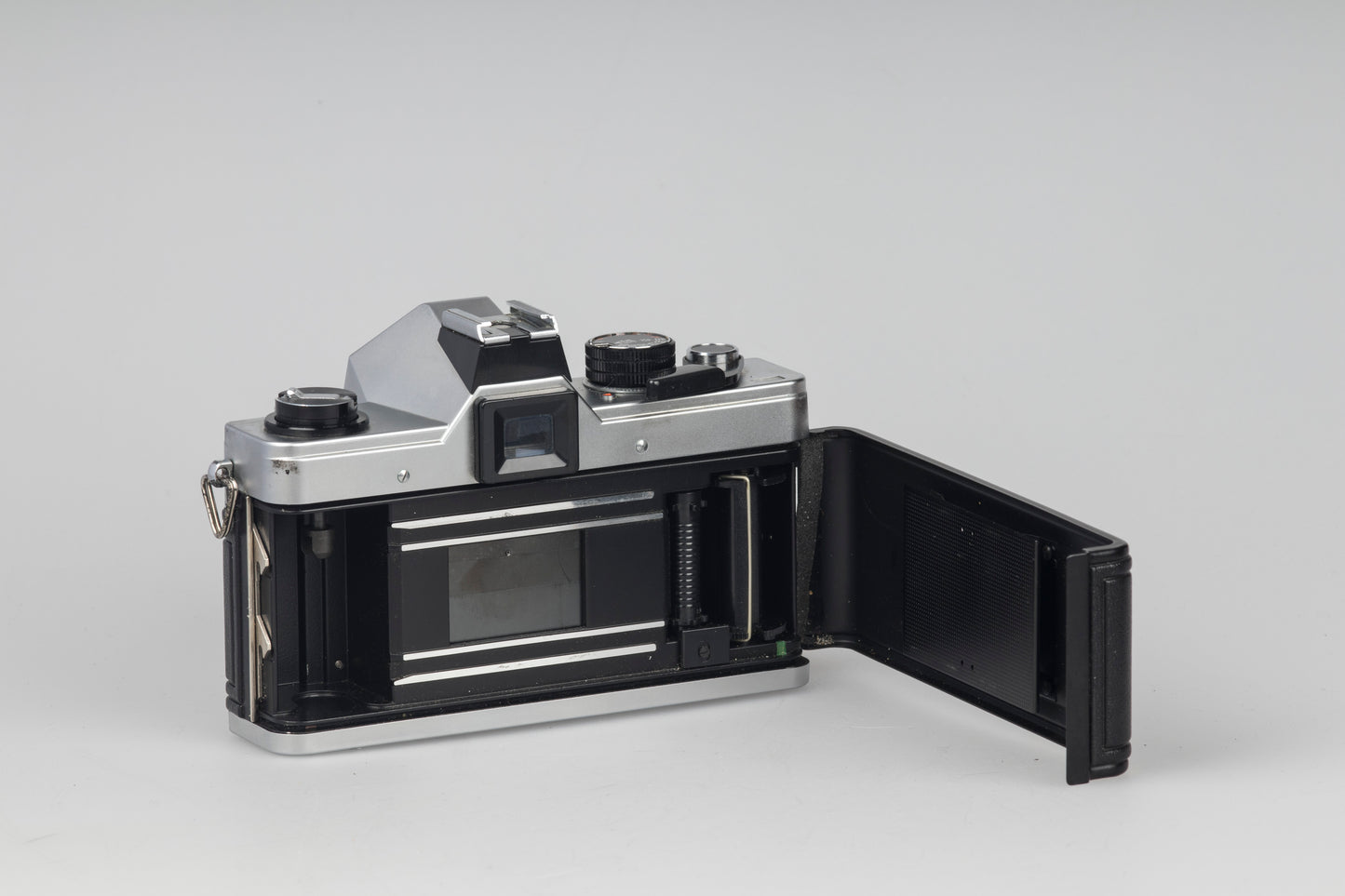 Praktica MTL 5 35mm film SLR camera with Rikenon 55mm f2.8 lens and ever-ready case