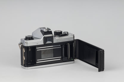 Praktica MTL 5 35mm film SLR camera with Rikenon 55mm f2.8 lens and ever-ready case