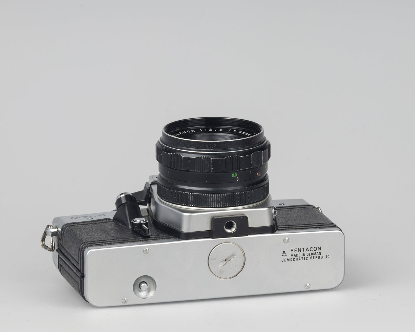 Praktica MTL 5 35mm film SLR camera with Rikenon 55mm f2.8 lens and ever-ready case