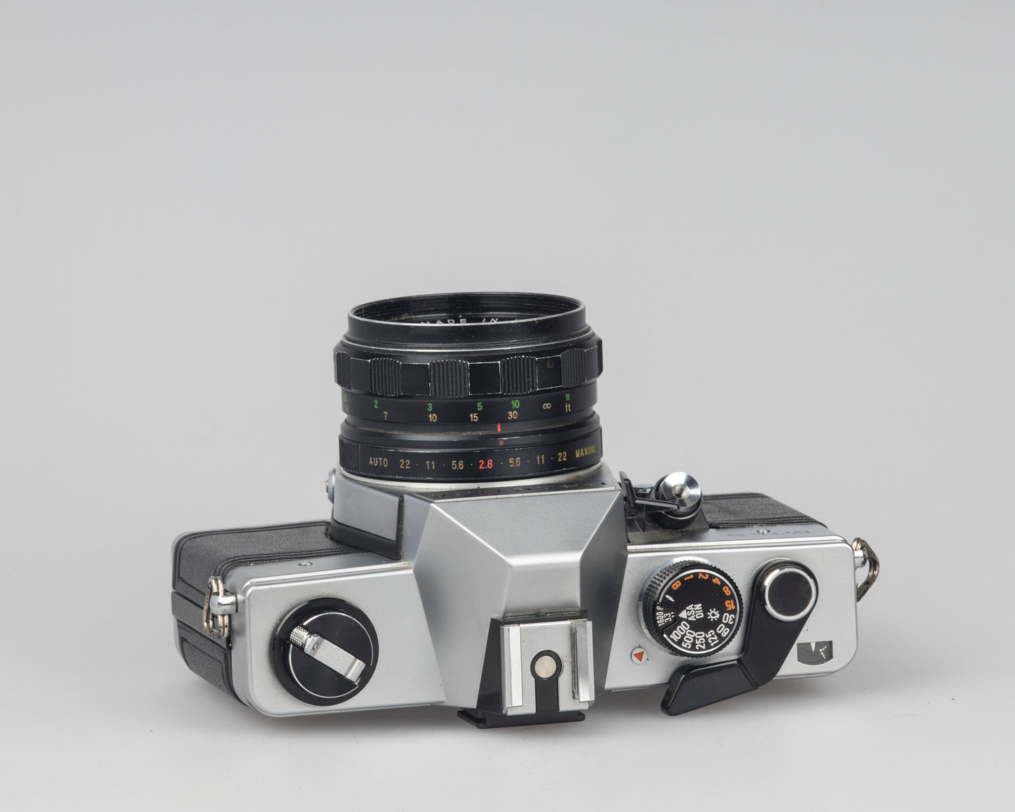 Praktica MTL 5 35mm film SLR camera with Rikenon 55mm f2.8 lens and ever-ready case