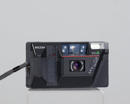 Ricoh AF-50 compact 35mm film camera w/ case (serial 90258043)