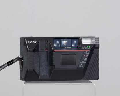 Ricoh AF-50 compact 35mm film camera w/ case (serial 90258043)