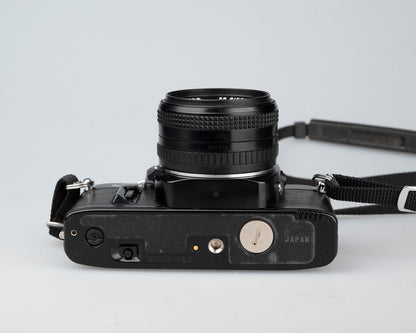 Ricoh XR-7 35mm SLR + XR Rikenon 50mm 1:2 lens + ever-ready case