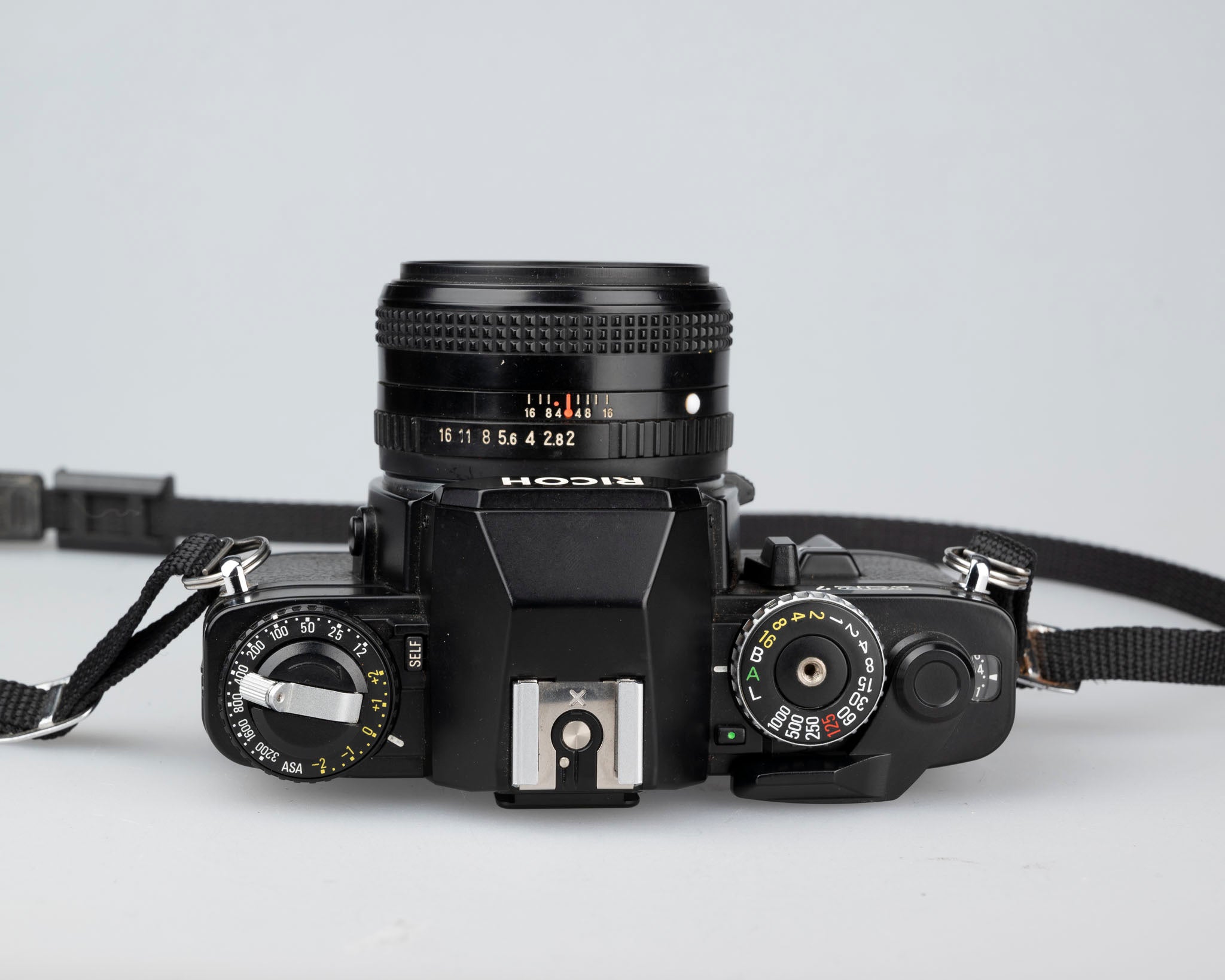 Ricoh XR-7 35mm SLR + XR Rikenon 50mm 1:2 lens + ever-ready case
