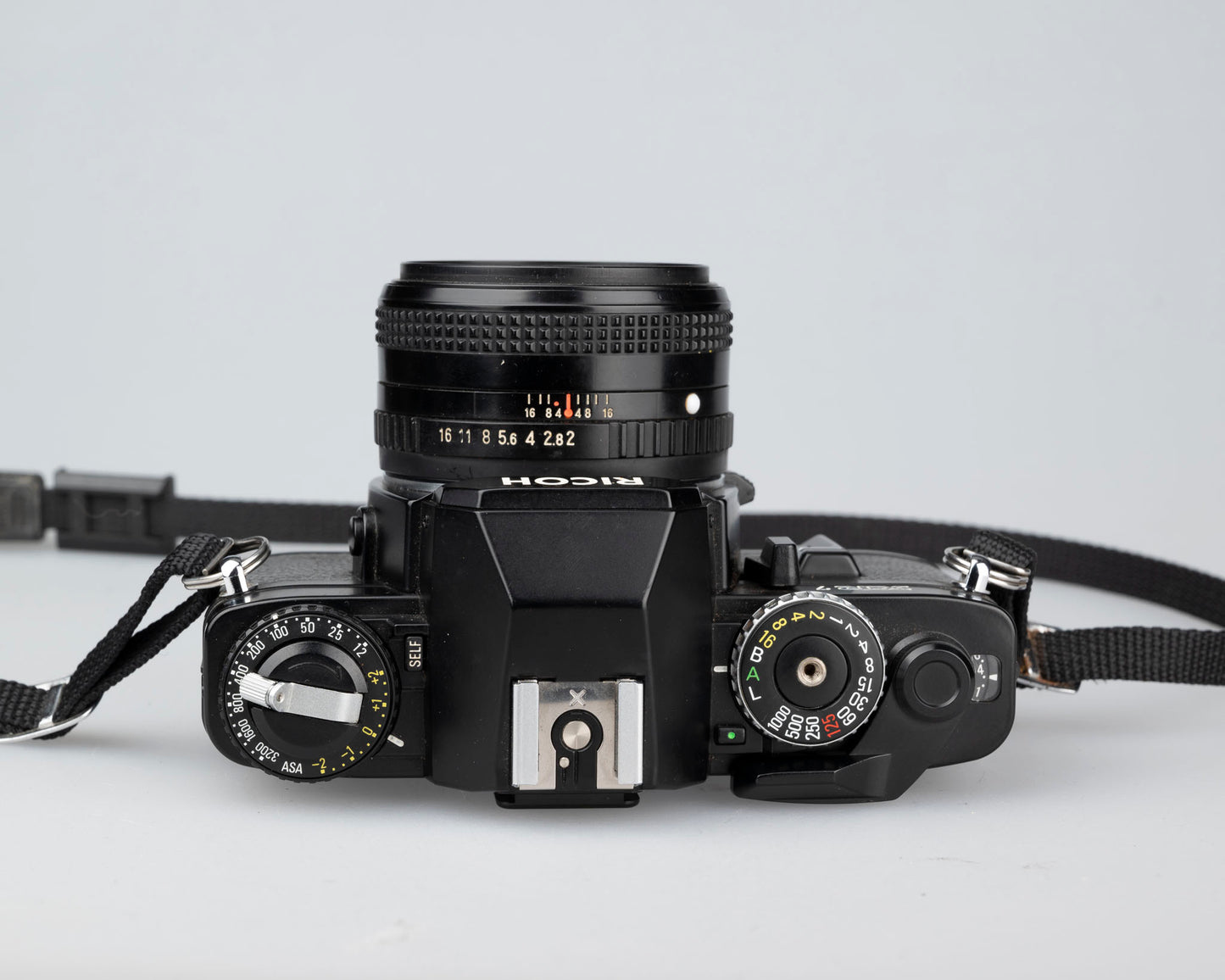 Ricoh XR-7 35mm SLR + XR Rikenon 50mm 1:2 lens + ever-ready case