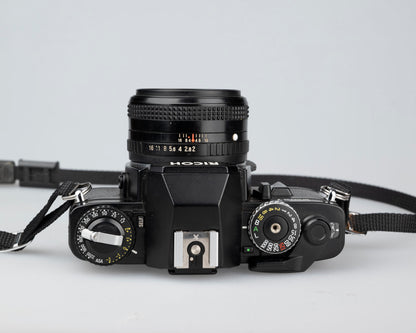 Ricoh XR-7 35mm SLR + XR Rikenon 50mm 1:2 lens + ever-ready case