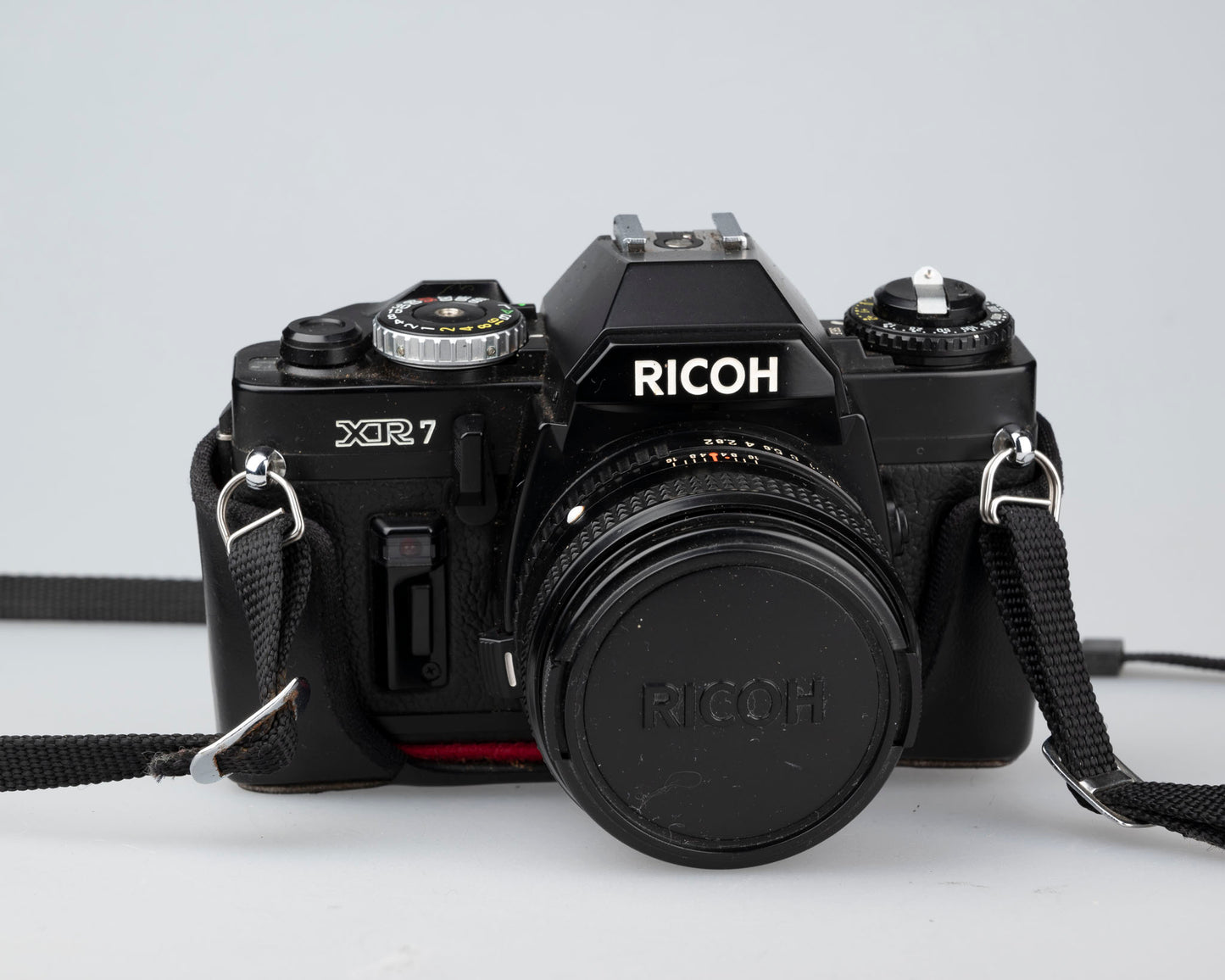 Ricoh XR-7 35mm SLR + XR Rikenon 50mm 1:2 lens + ever-ready case