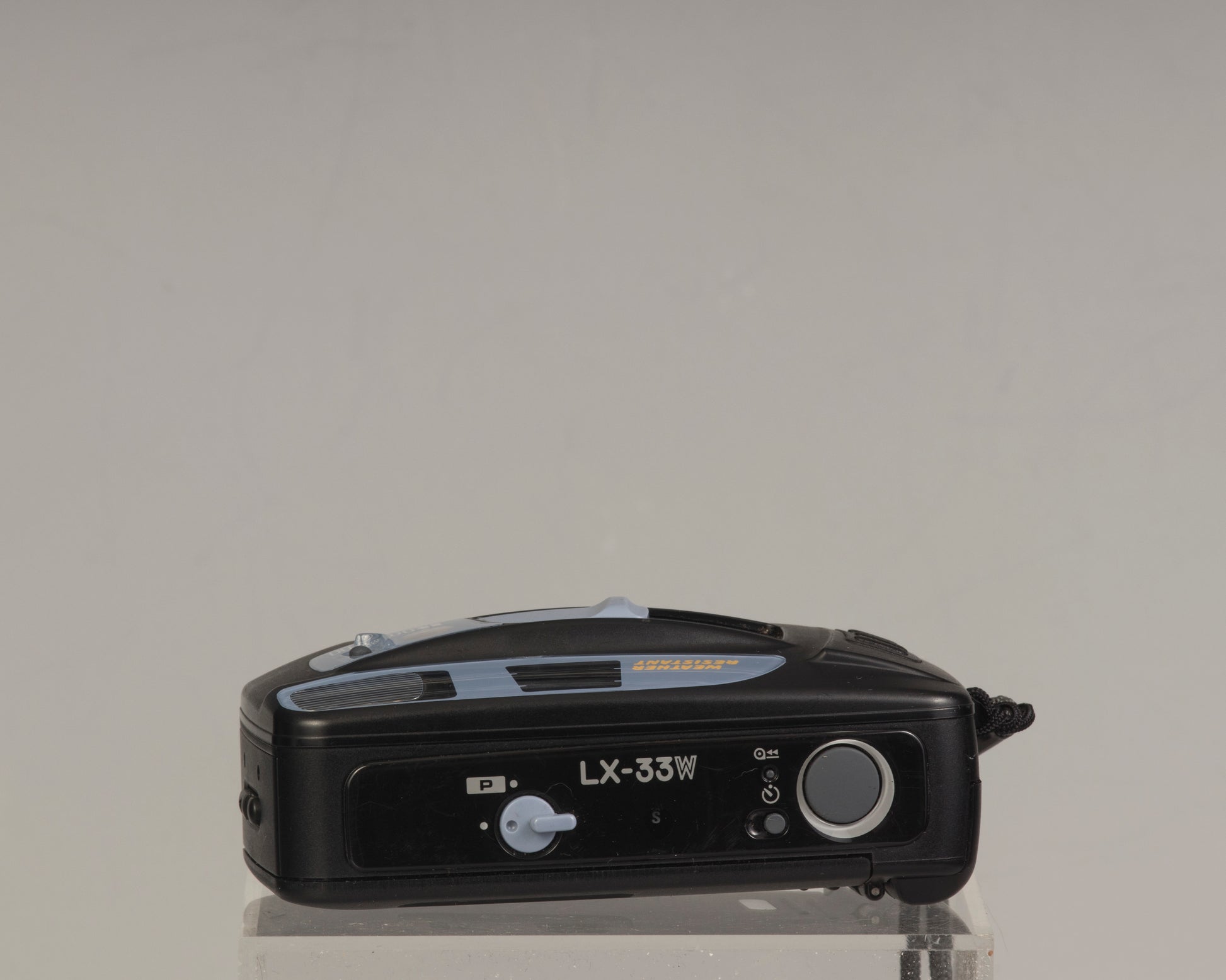 The Ricoh LX-33W is a simple weather-resistant 35mm film point-and-shoot camera from the 1990s