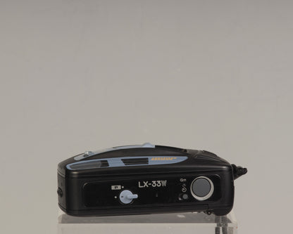 The Ricoh LX-33W is a simple weather-resistant 35mm film point-and-shoot camera from the 1990s