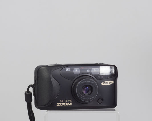 Samsung AF Slim Zoom 35mm film camera w/ case (flash not working)
