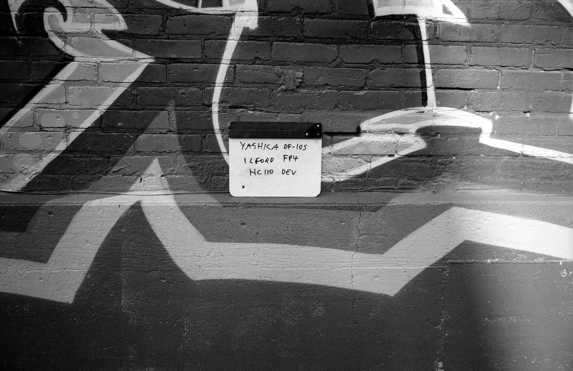 Yashica DF-10s film test scanned with Nikon CoolScan V-ED; note that the specs are due to dropping the negative on the floor (oops) and the light on the right side is an actual sunbeam