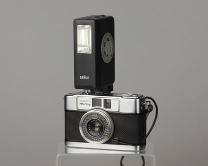 Yashica Mimy half-frame 35mm camera plus Braun flash