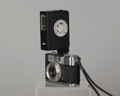 Yashica Mimy half-frame 35mm camera plus Braun flash