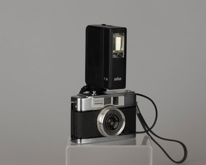 Yashica Mimy half-frame 35mm camera plus Braun flash