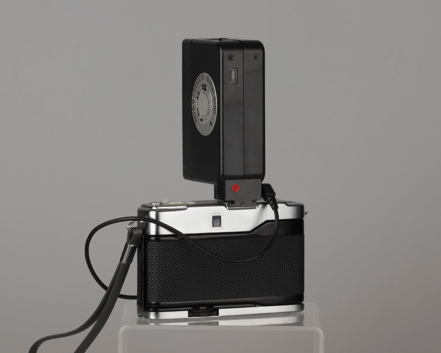 Yashica Mimy half-frame 35mm camera plus Braun flash