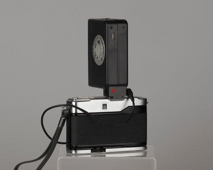 Yashica Mimy half-frame 35mm camera plus Braun flash