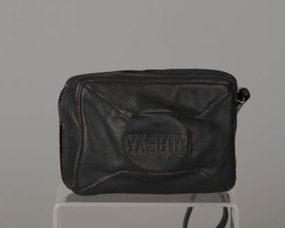Yashica Mimy half-frame 35mm camera plus Braun flash