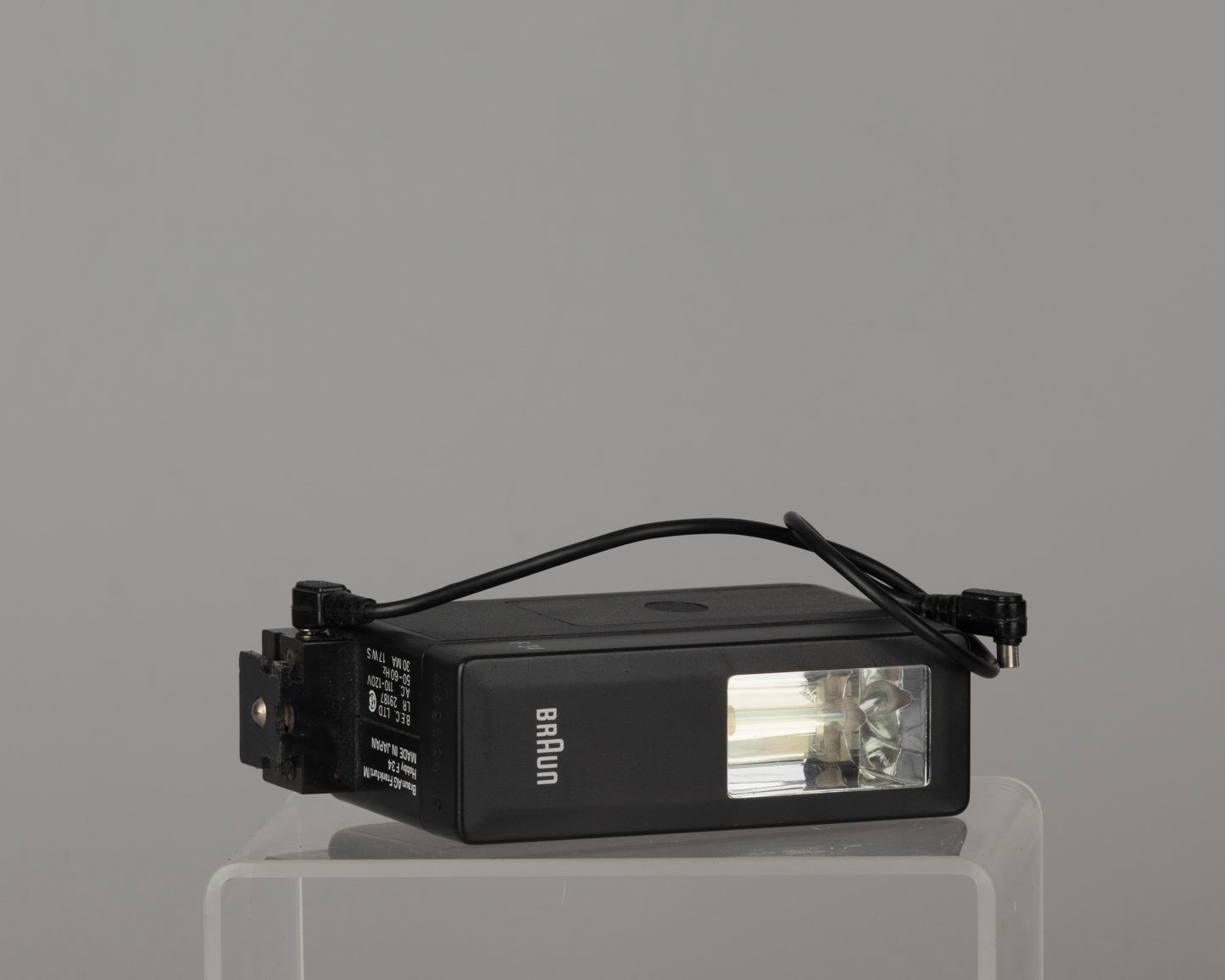 Yashica Mimy half-frame 35mm camera plus Braun flash