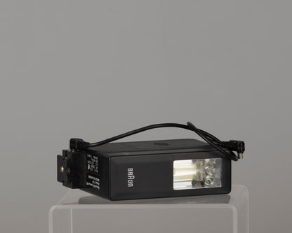 Yashica Mimy half-frame 35mm camera plus Braun flash